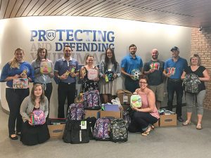 Halton's Compassion Society Partners With Guaranteed Removals To Provide 80 Backpacks to Children