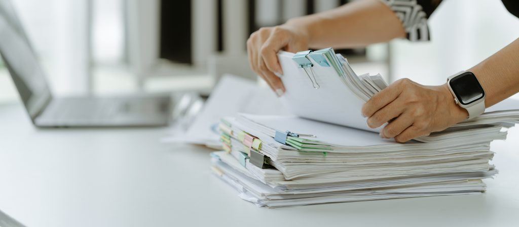 Business Documents, lawyer businesswoman checking searching document legal prepare paperwork or report for analysis legal time,attorney