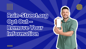 Man in green shirt smiling while holding up his cell phone