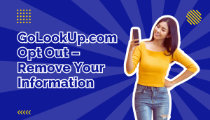 Woman in yellow shirt and blue jeans looking at phone