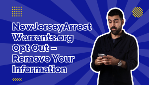 Man in black dress shirt looking at his cell phone