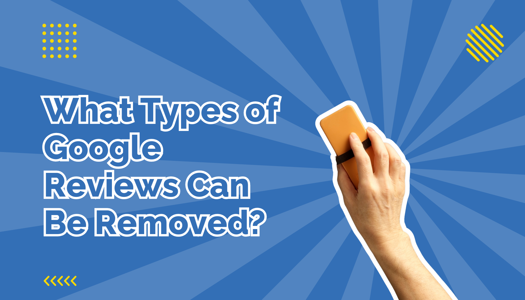 Hand holding an eraser.