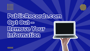 Hand holding up a laptop