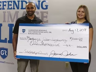 Guaranteed Removals Scholarship Cheque Presentation